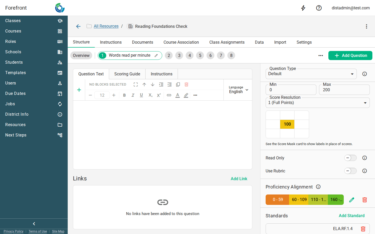 One question open in the editor: question text on the left, and its type, score range, proficiency alignment and standards on the right
